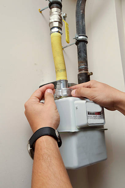 istock Repairman Tightens Gas Pipe,Turkey 513680414