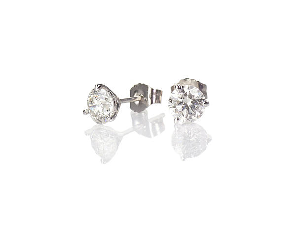 istock Diamond stud fine jewelry round brilliant pierced earrings 513680490