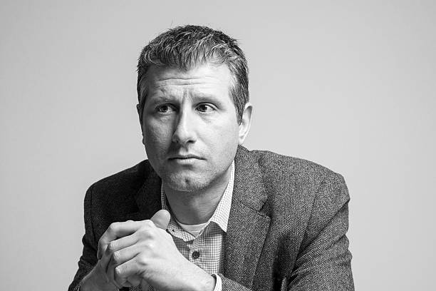 istock thinking attractive businessman portrait looking up 513680842