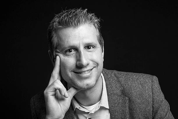 istock attractive businessman portrait looking happy at camera 513680928