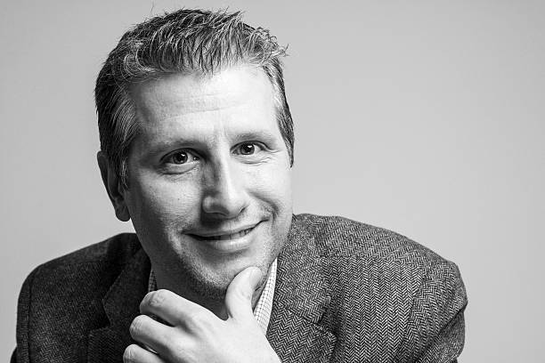 istock attractive businessman portrait looking happy at camera 513680960