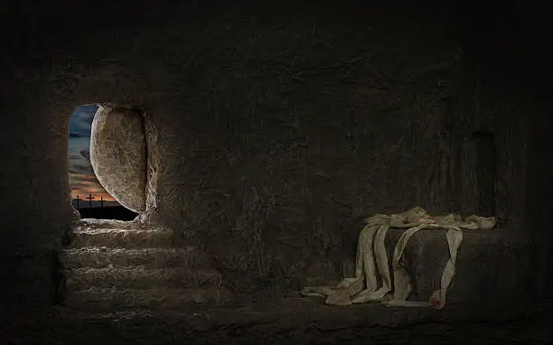 Empty tomb of Jesus with crosses in far hill