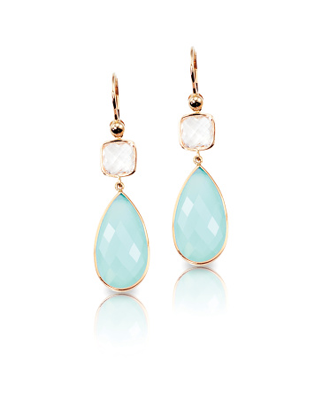 Blue crystal cushion cut quartz and topaz drop earrings isolated on white with a reflection