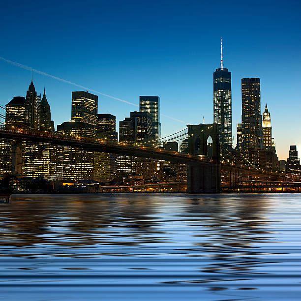 istock Panoramic view New York City Manhattan downtown skyline at night 513694178
