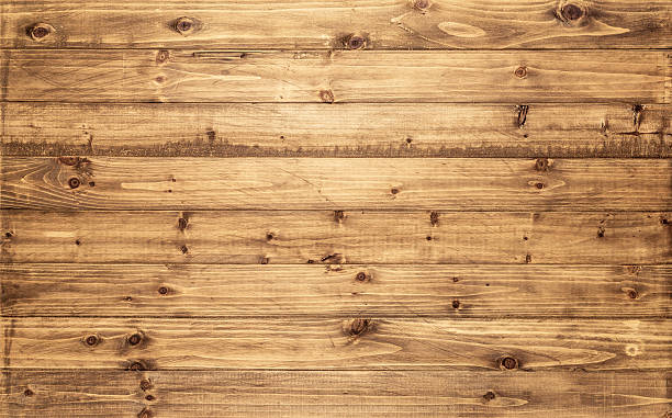 Light brown wood texture background Light brown wood texture background viewed from above. The wooden planks are stacked horizontally and have a worn look. This surface would be great as design element for a wall, floor, table etc. boarded up photos stock pictures, royalty-free photos & images