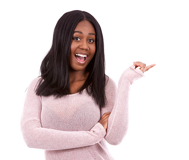istock casual black woman pointing 513694834