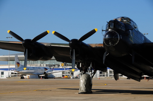 Jersey, U.K. - September 10, 2014: The vintage WW2 Avro Lancaster bomber part of the static airshow at Jersey airport for the Jersey International Airshow 2014.