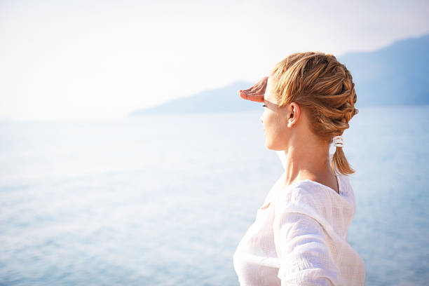 istock Woman looking over horizon 513708719