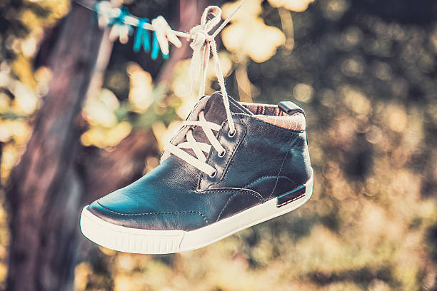 istock men's shoes in the air 513725681