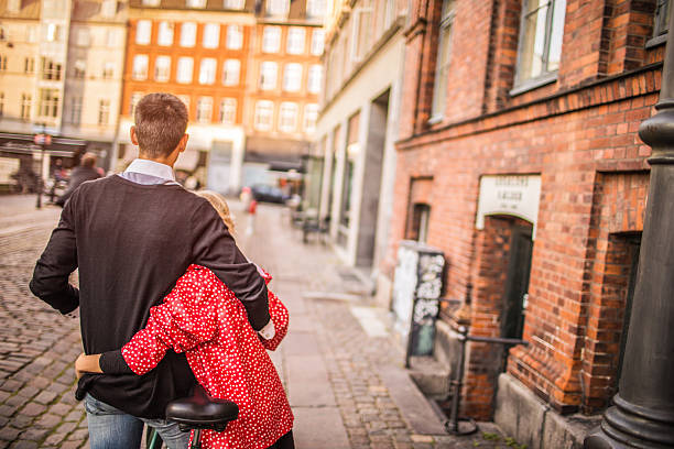 istock Loving young couple enjoying cycling 513727147