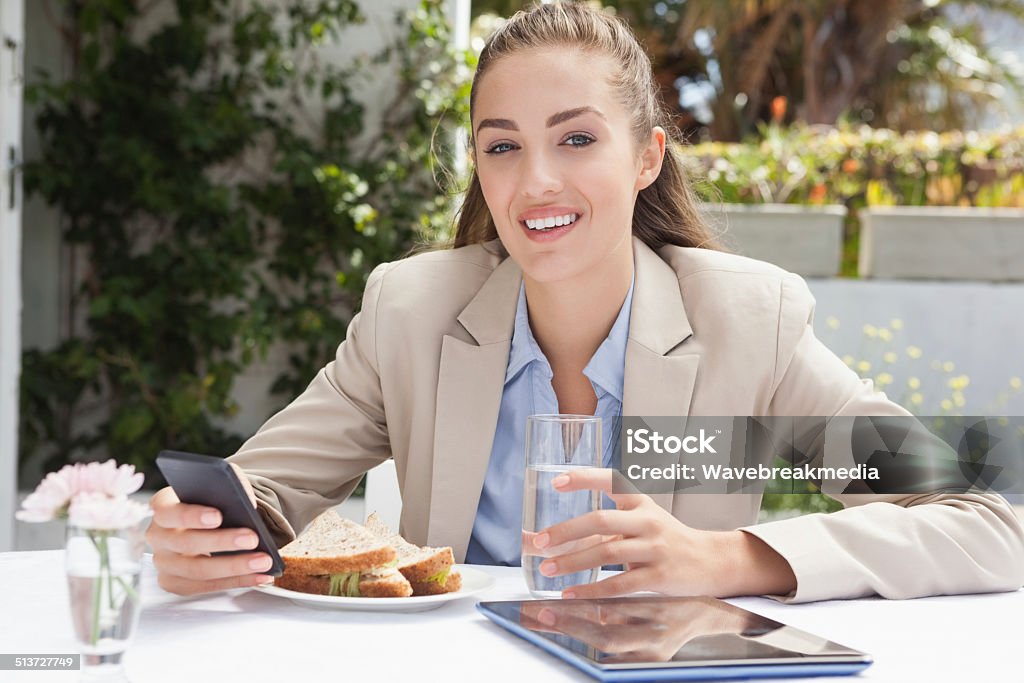 Beautiful businesswoman on her lunch Beautiful businesswoman on her lunch outside at the coffee shop 18-19 Years Stock Photo