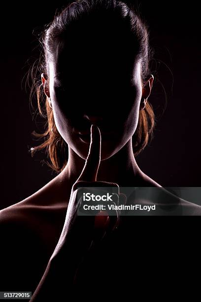 Taboo Stock Photo - Download Image Now - Finger on Lips, Women, One Woman Only