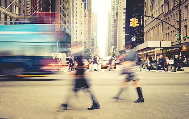 ニューヨーク市 - crosswalk crowd activity long exposure ストックフォトと画像