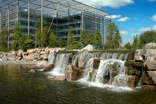 Business park with waterfall in England / United Kingdom