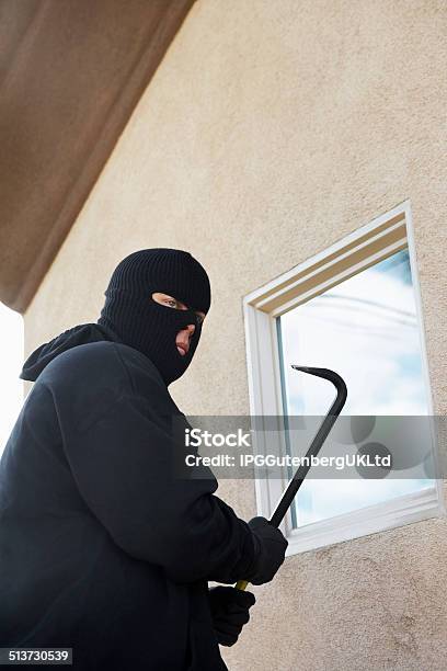 Burglar Breaking Into Home Stock Photo - Download Image Now - 30-39 Years, 35-39 Years, Adult