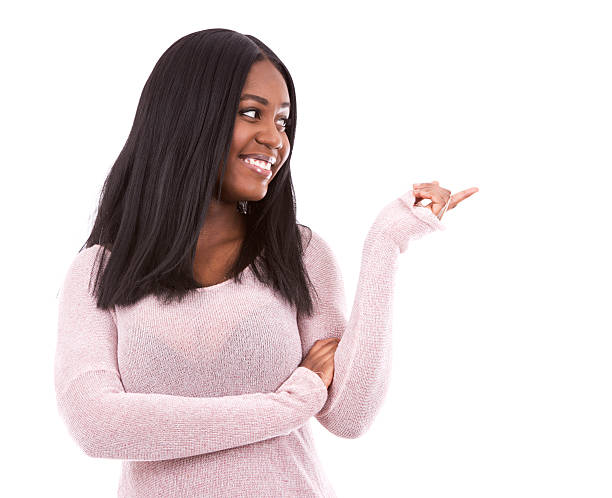 istock casual black woman pointing 513732630