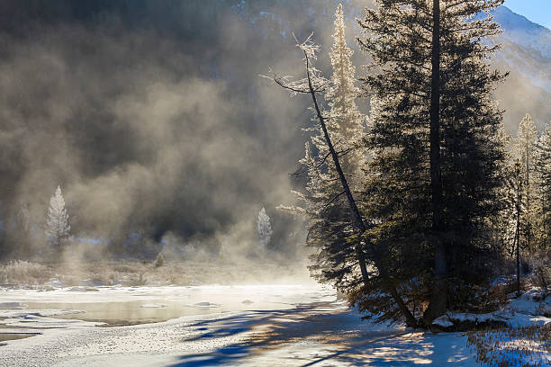 istock Beautiful winter mountain landscape with frozen river. 513735834