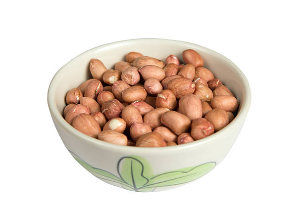 istock Isolated a bowl of peanut 513736604