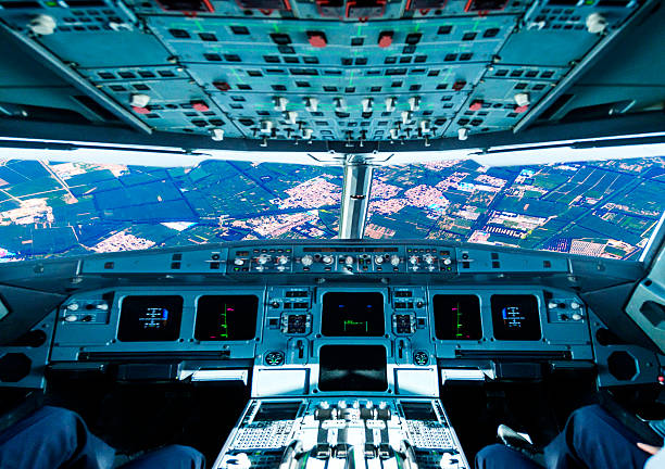 istock plane cockpit and city of night 513736778