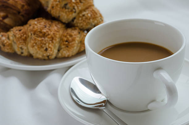 istock Cup of Coffee and Sesame Croissant for Breakfast. 513737566