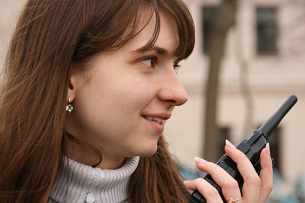 Girl with walkie-talkie. stock photo