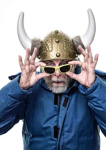 istock Horned Helmet Armor Senior Man Peeking Over Grubby Opaque Sunglasses 513741462