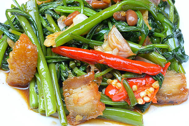 istock fried morning glory with crispy pork, stir fried water spinach. 513743192