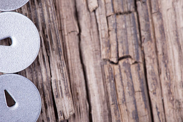istock abstract background of rotten board and round hats pushpin 513743430