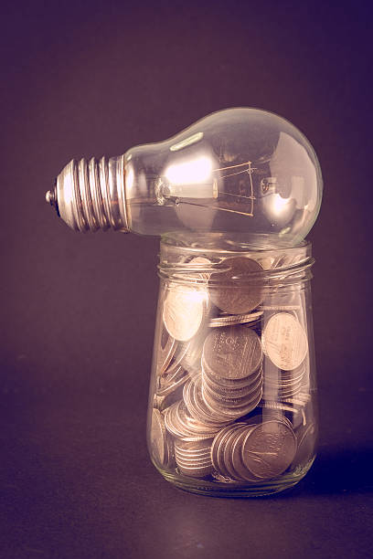 istock lamp and money with filter effect retro vintage style 513747716