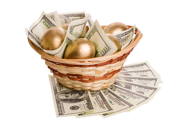 istock golden eggs and dollars in a basket isolated 513748594