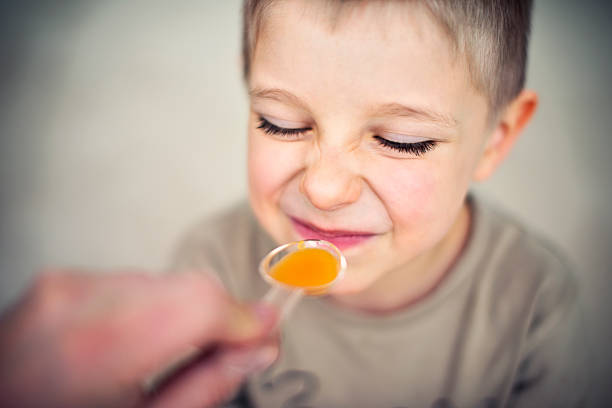 istock Little boy aged 4 taking a medicine 513749902