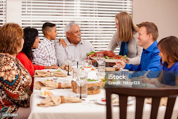 Multiethnic Generation Family Enjoys Thanksgiving Dinner Stock Photo - Download Image Now
