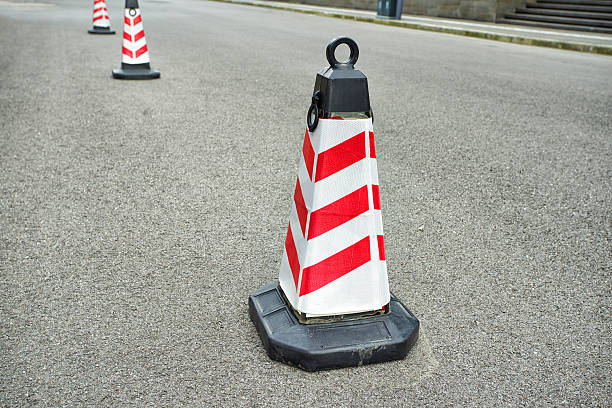 istock traffic cones on asphalt road 513750855