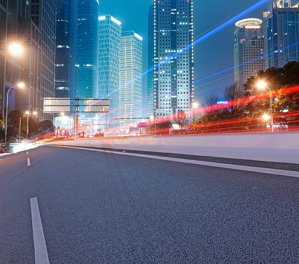 istock Asphalt road and modern city 513751183