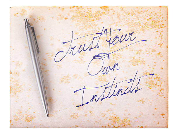 istock Old paper grunge background - Trust your own instincts 513751317