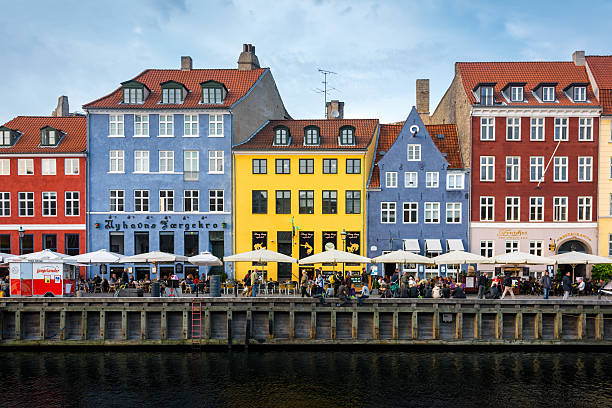 Colorful Houses Nyhavn Copenhagen Colorful Houses at Nyhavn in Copenhagen, Denmark - one of the most popular tourist places in Denmark. Nyhavn, Copenhagen,Denmark nyhavn stock pictures, royalty-free photos & images
