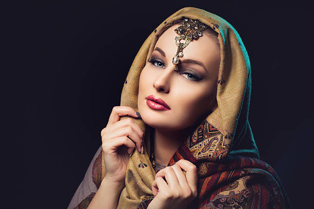 istock Beautiful young woman in shawl 513752190