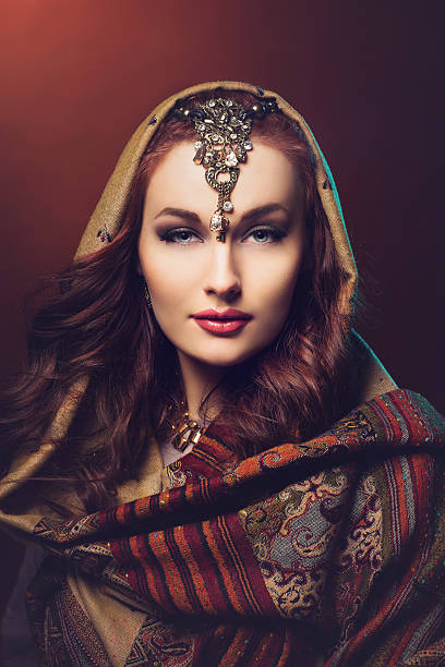 istock Beautiful young woman in shawl 513752512