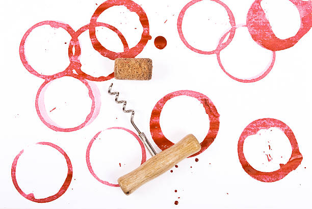 istock Wine cork, corkscrew and round, red wine stain 513752594