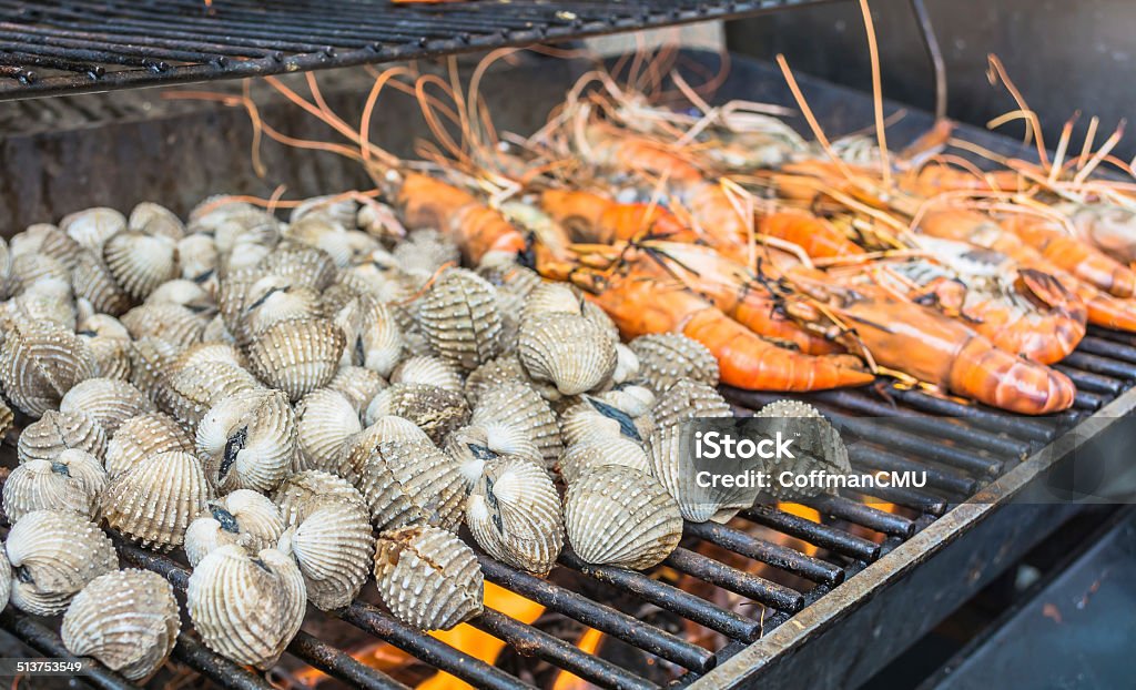 grill shrimp and shellfish grill freshwater shrimp and shellfish on flame image Animal Shell Stock Photo