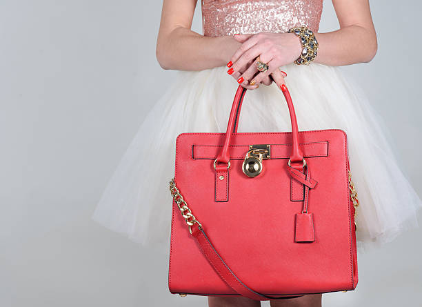 istock Red stylish glamorous female leather bag on pure background 513753752