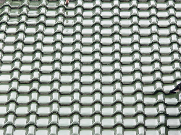 istock Roof tiles green gloss 513753952