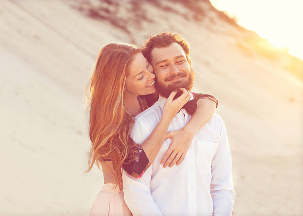 istock Young couple in love walking autumn park 513754330