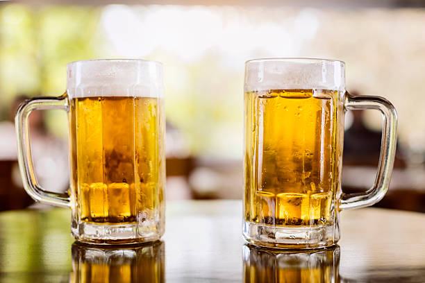 Two glasses of beer stock photo