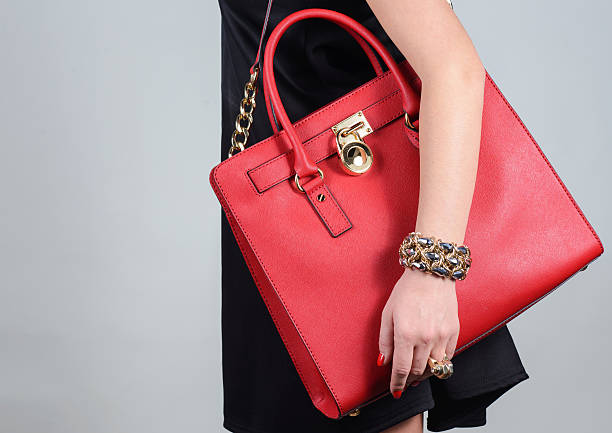istock Red stylish glamorous female leather bag on pure background 513754654