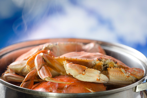 Cooking crab in a pot.