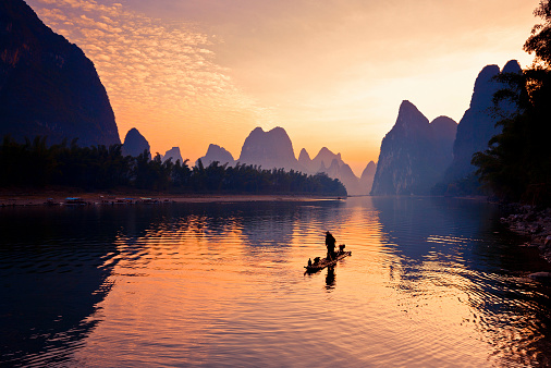 This is the most beautiful section of karst landscape along the Li River！\nChina - East Asia,Guilin,Yangshuo county,Yangdi township,\nXingping town.\nGuilin karst has been included in the world heritage list.\nKarst landform scenery along the Li River,From Guilin to Yangshuo,It is 63 km in length and divided into three sections:\nGuilin-Yangdi,Yangdi-Xingping,\nXingping-Yangshuo.It's the most beautiful landscape waterway has about 15 km,It goes from Yangdi to Xingping.\nHere the Li River snakes through a fairy-tale landscape of conical limestone peaks,its smooth waters exquisitely mirroring the magical.\nLijiang River and its tributaries,the shuttle in the \nShiShanfeng forest,mountains and water and hold,very beautiful.\nBeautiful Lijiang River,is the world's largest and most beautiful karst landscape scenic resort.\nGuilin is the country a shining pearl in the mountains and rivers, unique and beautiful Lijiang River karst making it a world-famous tourist destination.\nLarge numbers of tourists visit the Li river by yachts every year.
