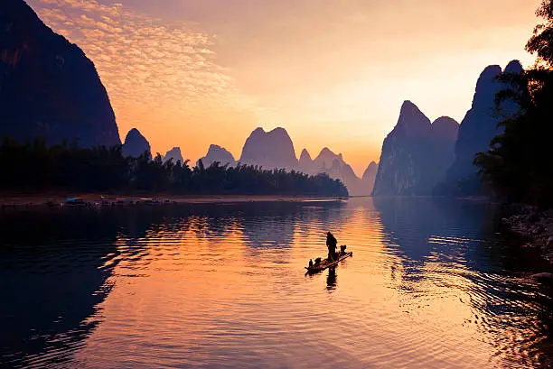 Fishermen fishing in the morning,Li River,Yangshuo,Guilin,Guangxi,China.