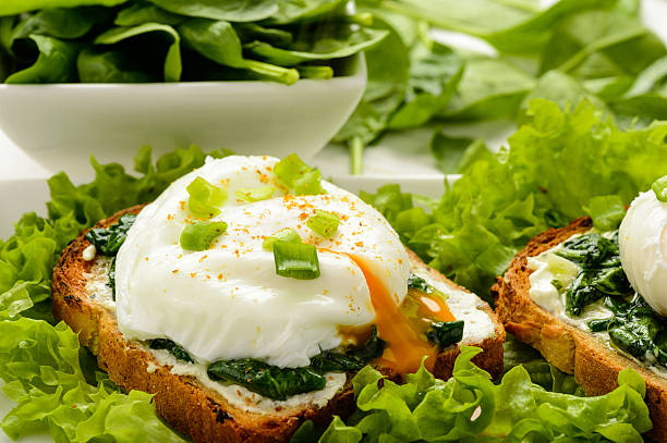 istock Healthy breakfast - sandwich with creme cheese, spinach and egg. 513755198