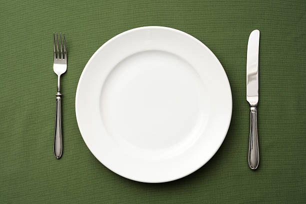 istock Overhead shot of place setting on green tablecloth 513755407